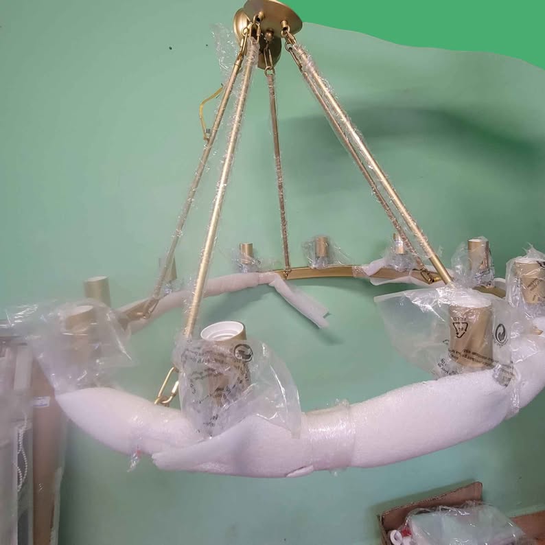 Lámpara de araña grande y moderna con rueda de carro, de metal dorado,...