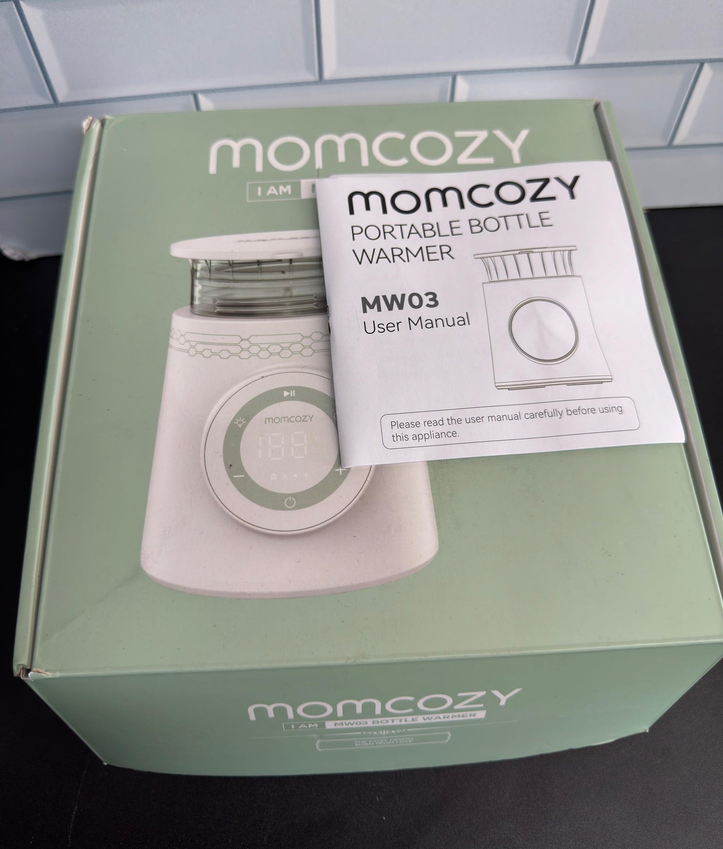 Calientabiberones portátil Momcozy para viajes