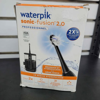 Waterpik Sonic - Cepillo de dientes e irrigador dental profesional Fus...